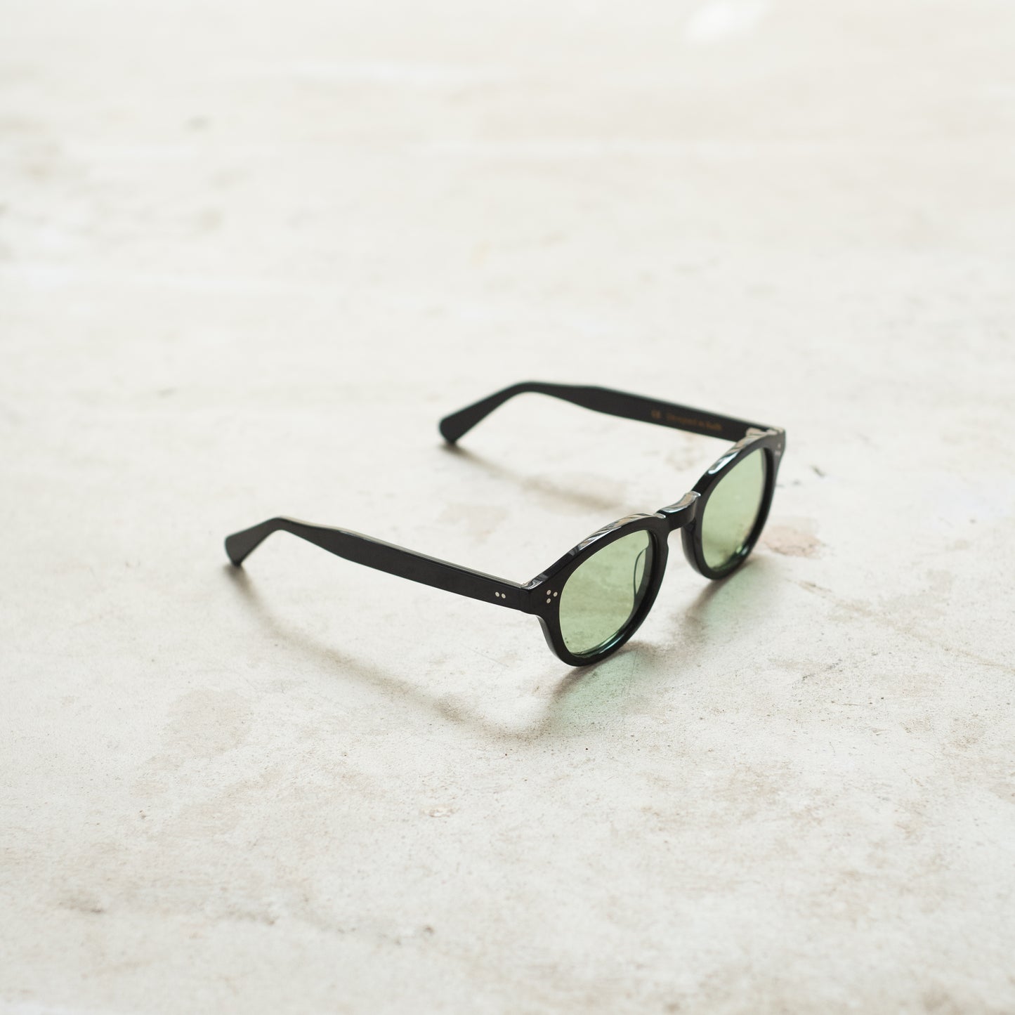 105 Black Frame with Light Green Lenses