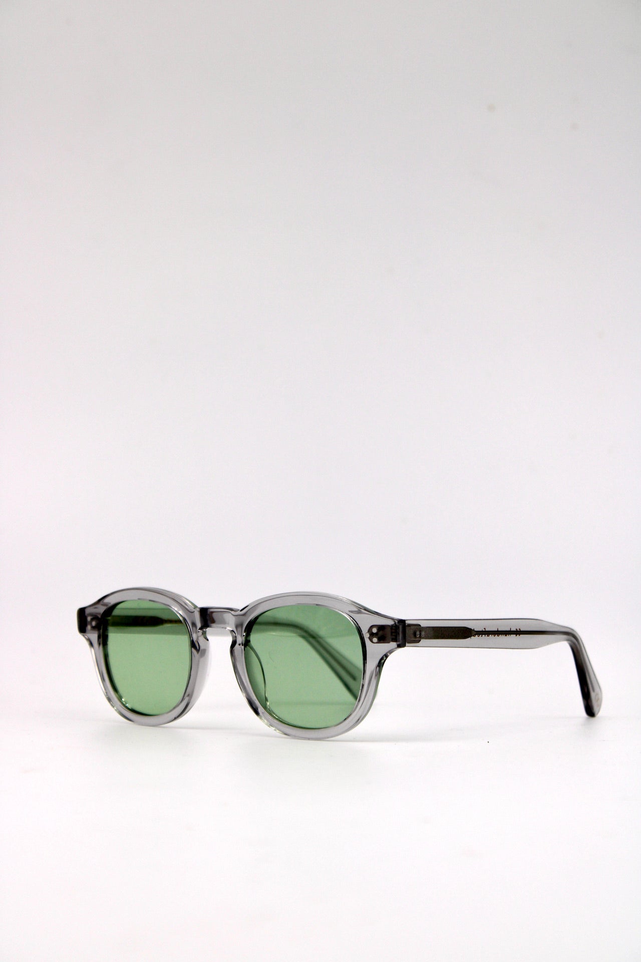 Clear frame shop green lens sunglasses